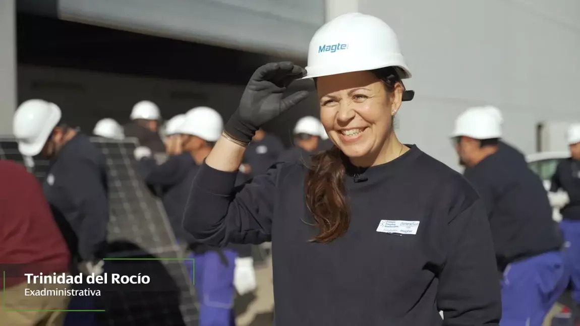 Trinidad wearing a hard hat at an installation site